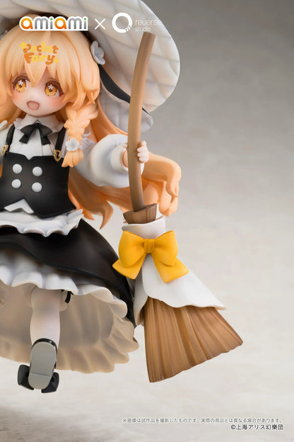 Touhou Project Pocket Fairy Marisa Kirisame figure holding a broom in a black-and-white witch outfit on a yellow star-shaped base.
