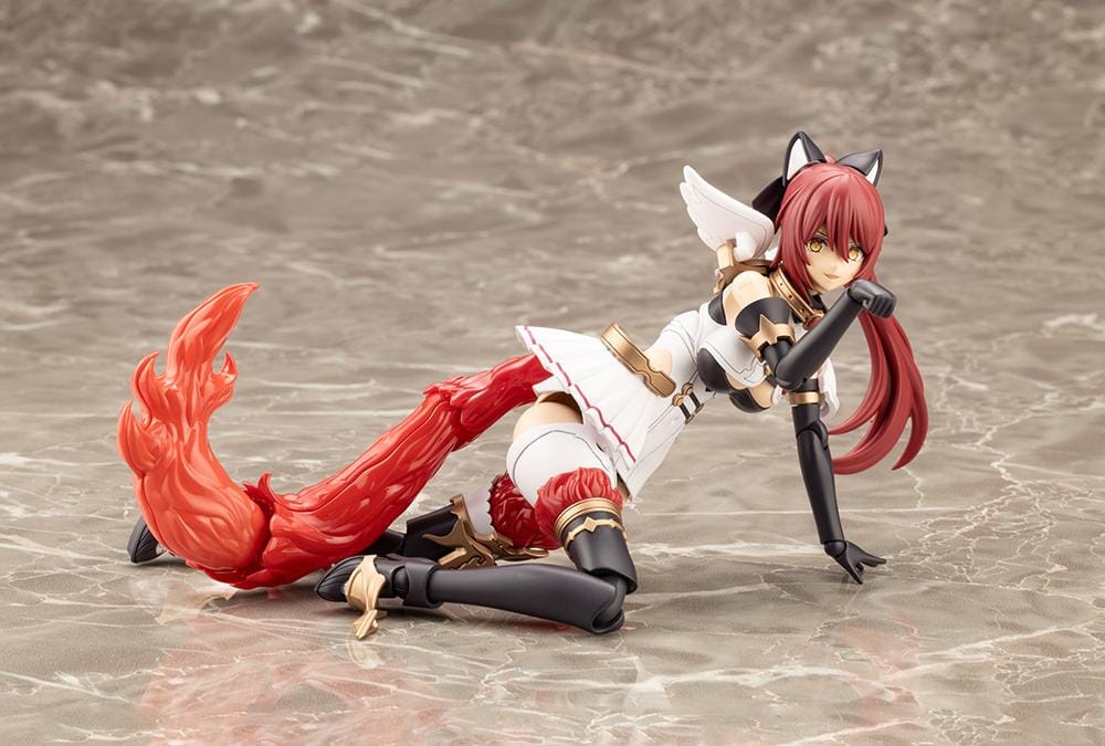 Assembled Arcanadea Charmed model kit with red hair, animal ears, a white and black outfit, gold armor accents, and a sweeping flame-like red tail.