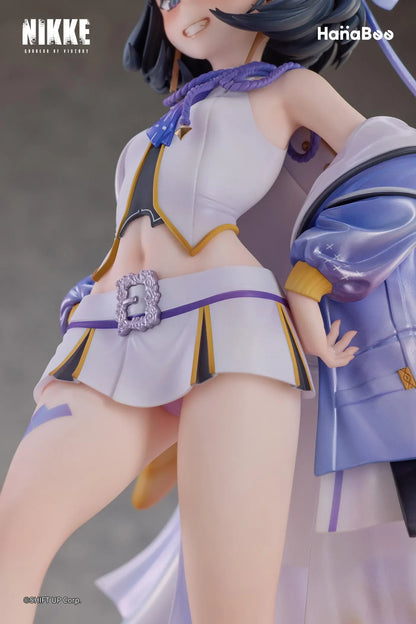 Goddess of Victory Nikke Syuen Deluxe Edition 1/6 Scale Figure featuring Syuen in a white-and-purple outfit with ribbon details, themed base, chibi mascot accent, can badge, and acrylic-style bonus artwork.