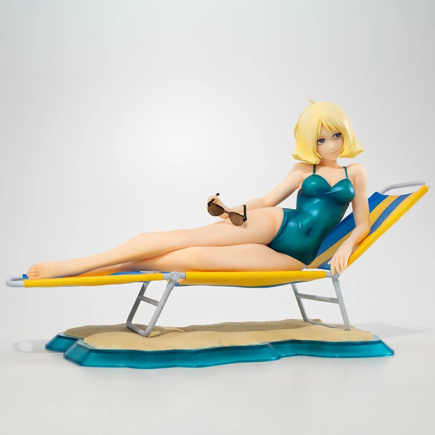 Mobile Suit Gundam Gundam Girls Generation Sayla Mass Break Time Reissue featuring Sayla lounging on a beach chair with teal swimsuit, sunglasses, and beach-themed display base.