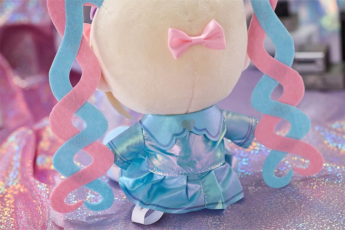 NEEDY GIRL OVERDOSE OMGkawaiiAngel Punipuni plushie with pink and blue spiral twin-tails, embroidered blue eyes, and a shimmering blue outfit.