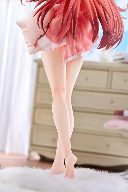 GODDESS OF VICTORY: NIKKE Rapi: Red Hood Cherished Red 1/7 scale figure wearing dark sleepwear and a pink cardigan while holding a pillow.