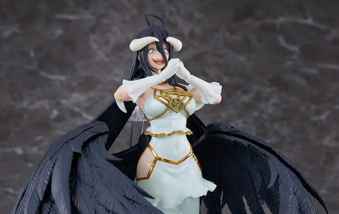 Overlord The Holy Kingdom figma Albedo Figure wearing her white and gold dress with large black feathered wings and signature horns