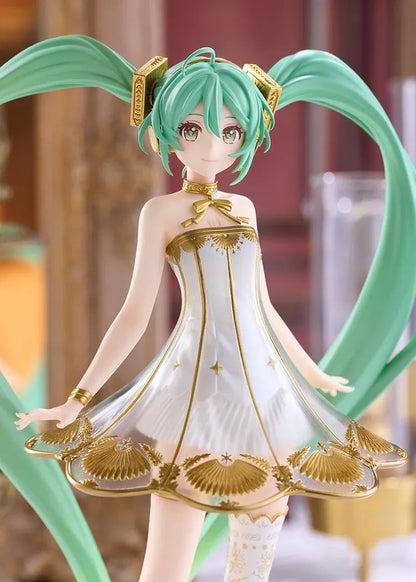 Hatsune Miku POP UP PARADE Symphony 2020 Ver. L Size Figure featuring long turquoise twin-tails, green eyes, an elegant white dress with gold detailing, decorative stockings, and matching gold accessories.