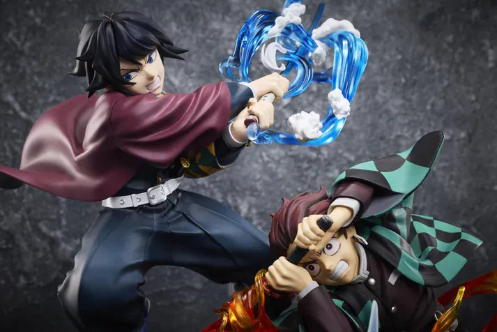Demon Slayer Tanjiro Kamado, Giyu Tomioka, and Akaza vignette figure featuring translucent water and fire battle effects.