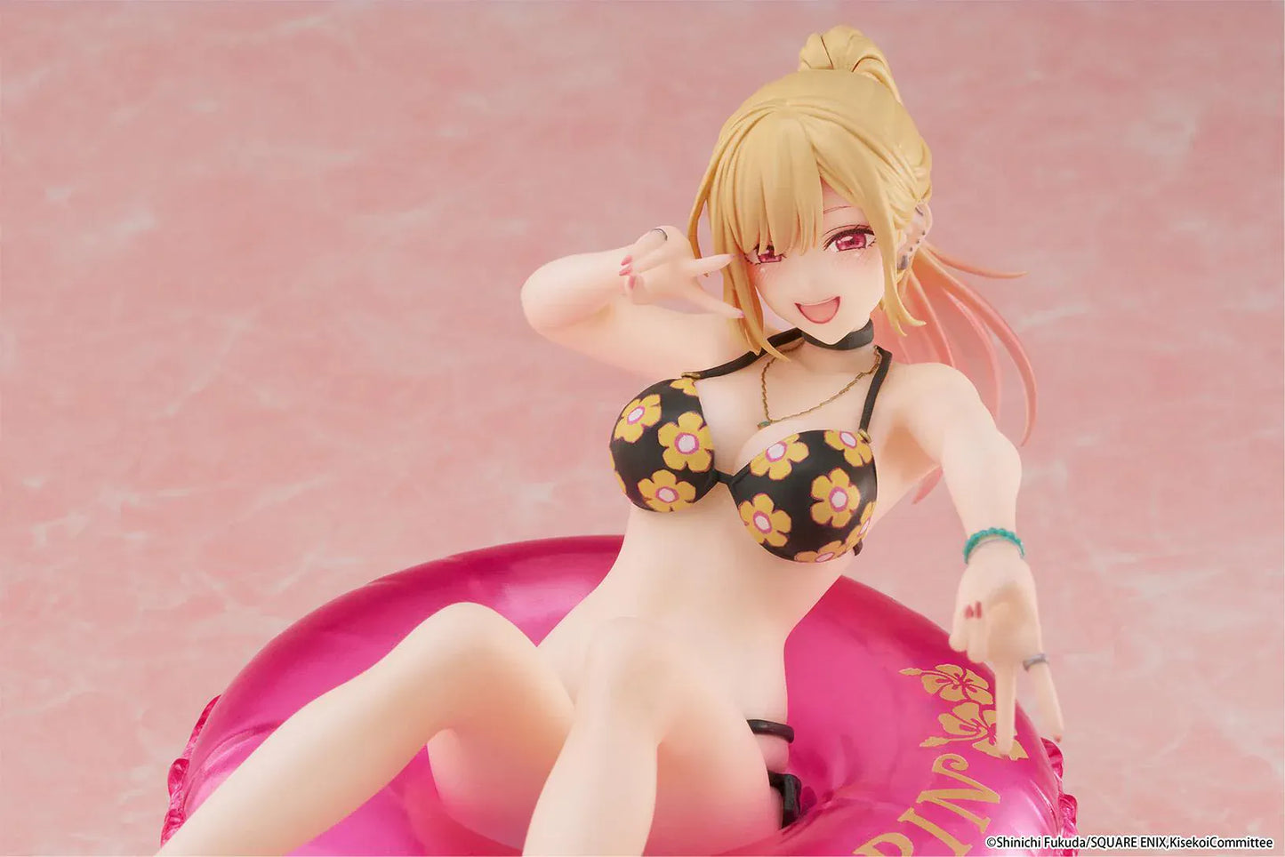 My Dress-Up Darling Aqua Float Girls Marin Kitagawa Figure Rerelease featuring Marin relaxing on a pink swim float with floral swimsuit and translucent water-style base.