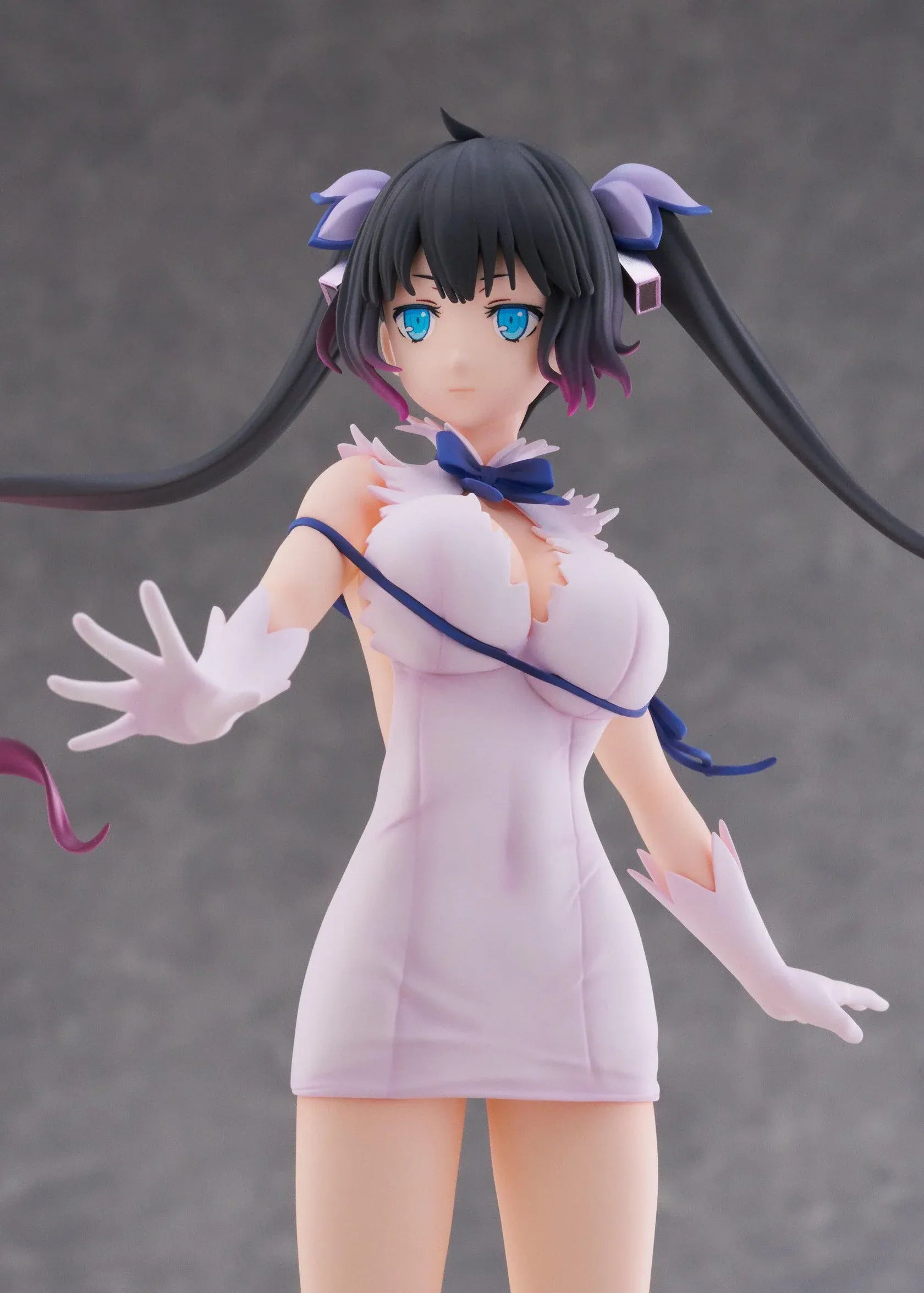 Is It Wrong to Try to Pick Up Girls in a Dungeon V Hestia Divinity Unleashed Limited Edition Ver. 1/7 Scale Figure with twin-tails, white outfit, blue ribbon accents, rocky base, and flame effect parts