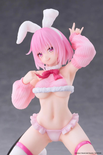 To Love-Ru Darkness MOFLOCK Momo Fluffy Bunny Ver. Figure featuring a pink-haired anime girl with pink eyes, white bunny ears, a pink fluffy bunny outfit, matching sleeves, white thigh-high stockings, and a black devil tail in a playful kneeling pose.