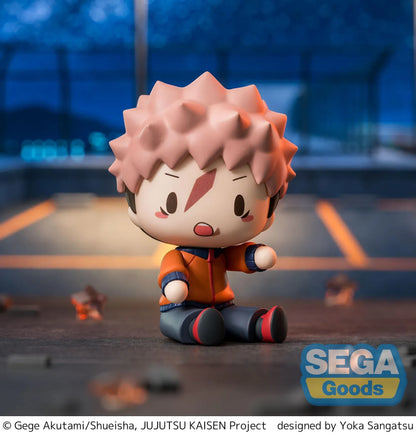 Yuji Itadori chibi figure in a seated pose with pink hair, facial markings, and an orange and navy outfit.