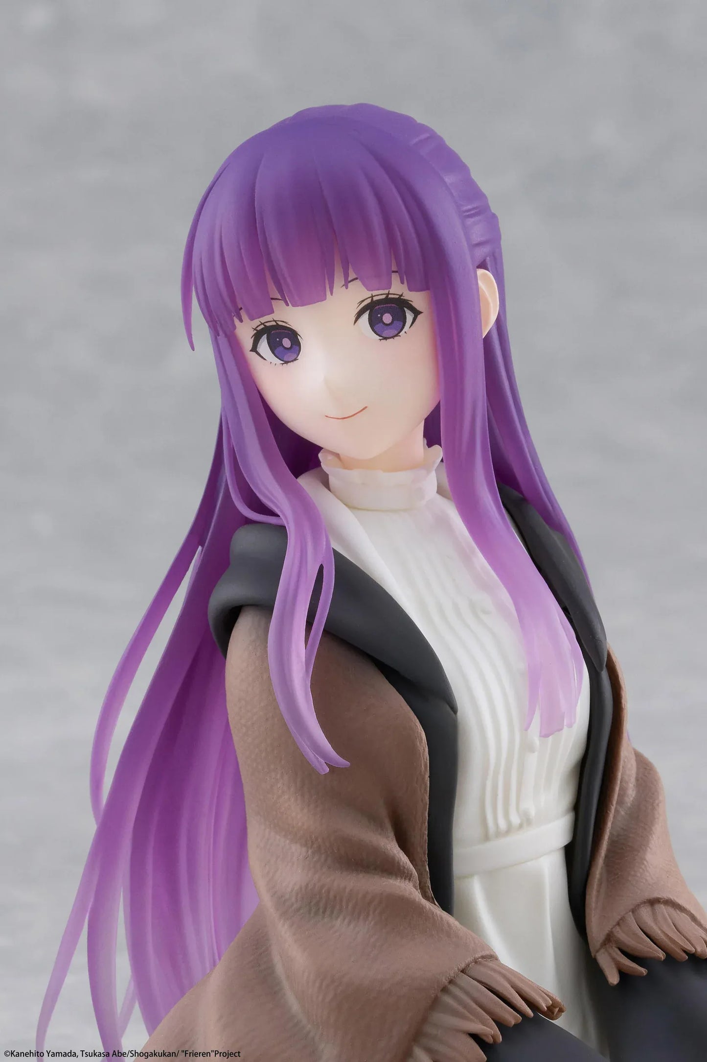 Frieren Beyond Journey's End Desktop Cute Fern Figure with purple hair wearing a shawl and white dress in a seated pose