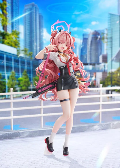 Blue Archive Kirara 1/7 scale figure with long pink hair, school uniform, pink and black weapon, halo, and translucent pink display base
