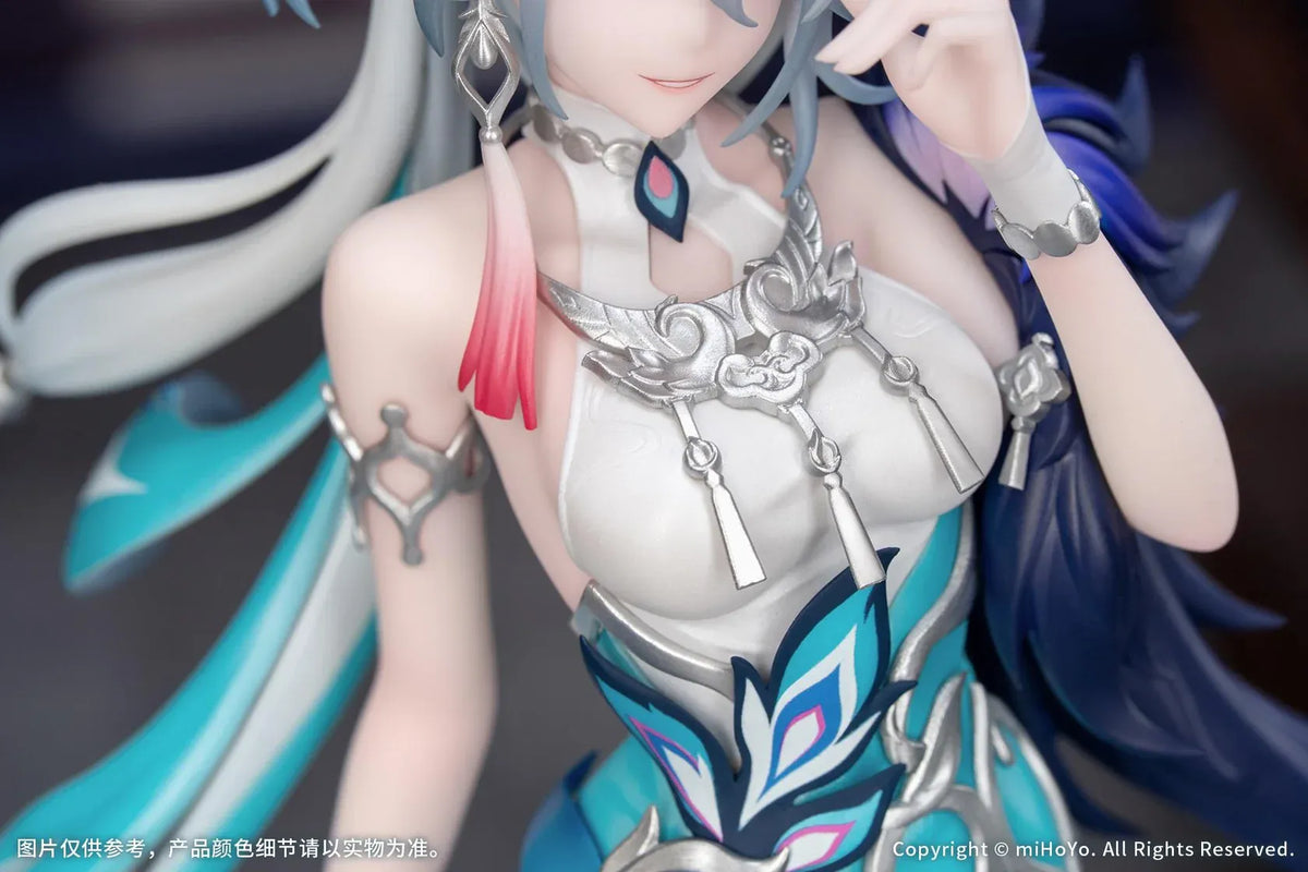 Yao Guang 1/8 scale figure wearing an elegant white-and-teal outfit with silver ornaments and feather-inspired decorations.