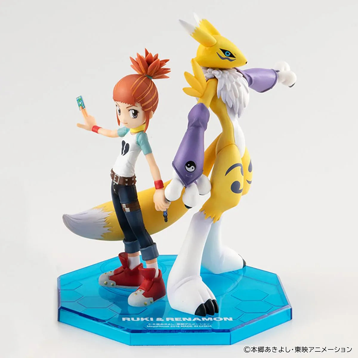 Digimon Tamers G.E.M. Series Renamon and Rika Nonaka figures, with Rika raising a green card beside yellow Renamon wearing purple yin-yang arm guards.