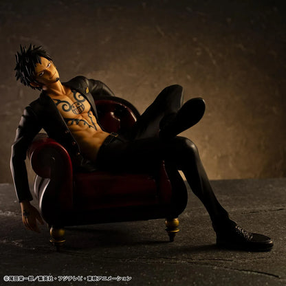 One Piece Portrait Of Pirates S.O.C. Trafalgar Law Ver. R Figure wearing a black suit and sitting in a red armchair