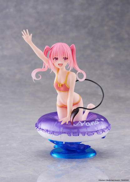 To Love-Ru Darkness Aqua Float Girls Nana figure featuring Nana with pink twin tails in a swimsuit posing on a purple float ring display base
