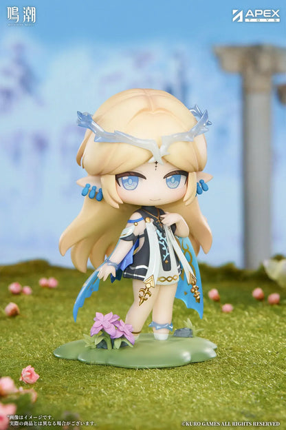 Chibi Cartethyia Jinseki Series figure with blonde hair, blue eyes, a pale blue headpiece, and a small armored companion, standing on a green floral base.