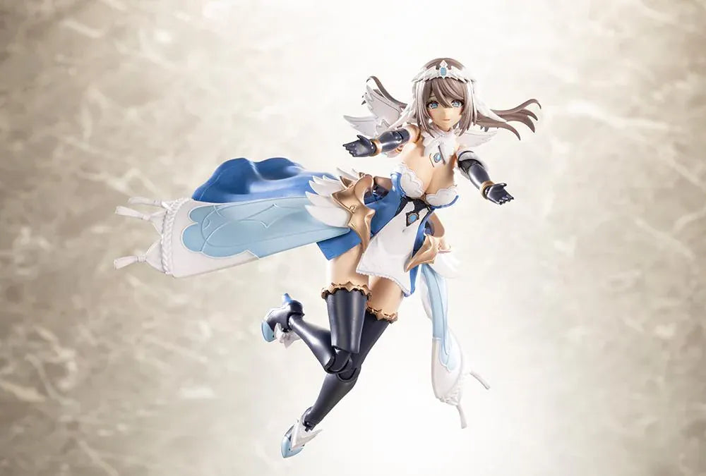 Assembled Arcanadea Ermeda model kit with long brown hair, white feathered wings, a blue and white outfit, gold armor accents, and armored boots.