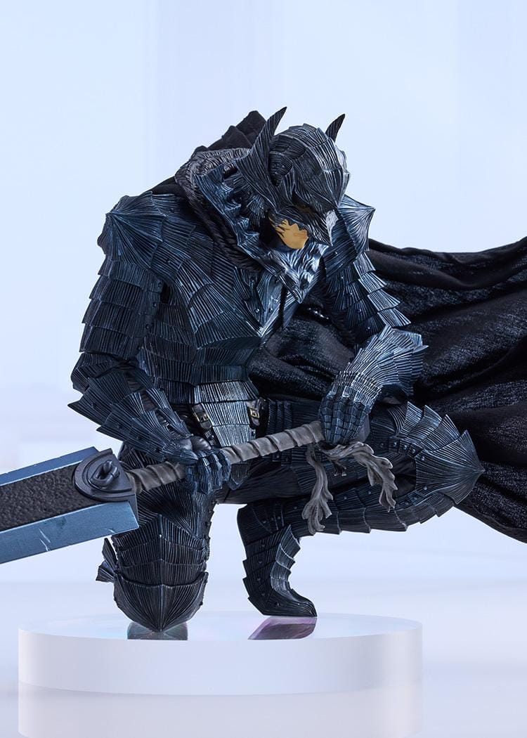 Berserk Guts and Griffith figure set, with Guts crouching in black armor holding a massive sword and Griffith standing in pale blue armor with flowing white hair.
