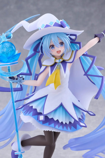 Snow Miku All Stars 2014 Ver. AMP+ figure wearing a white-and-blue snow sorceress outfit and holding a translucent magical staff.