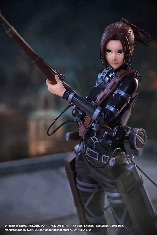 Sasha Blouse The Final Season Ver. Oshi Works figure holding a long rifle, wearing a black combat outfit with harness straps and equipment on a black base.