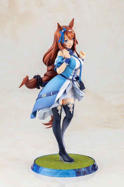 Uma Musume Pretty Derby Super Creek 1/7 Scale Figure featuring Super Creek in a blue-and-white outfit with red hair, horse ears, tail, and a cheerful pose on a themed base.