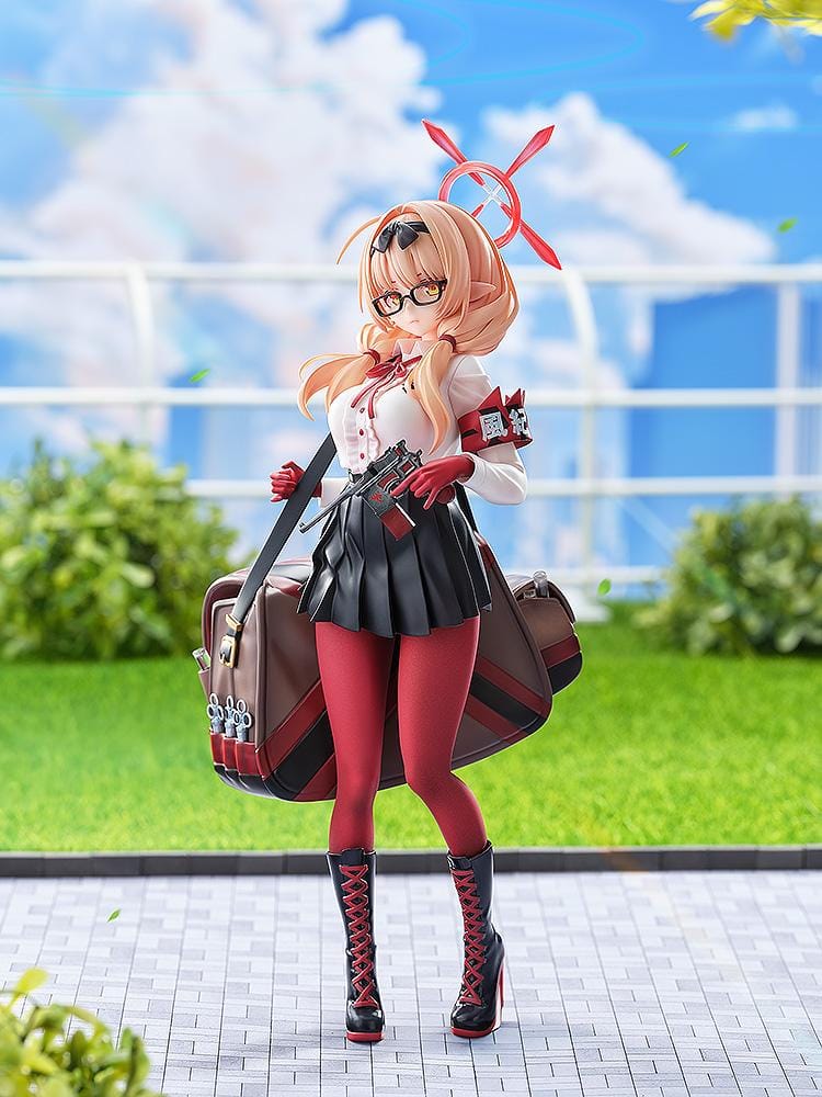 Blue Archive Chinatsu 1/7 Scale Figure featuring Chinatsu with pink hair, glasses, red gloves, halo detail, weapon accessory, and a large bag.