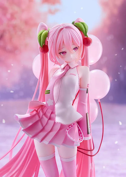 Sakura Miku figure with long pink twin-tails, cherry hair ornaments, a white and pink outfit, pink boots, and translucent balloons on a floral pink base.