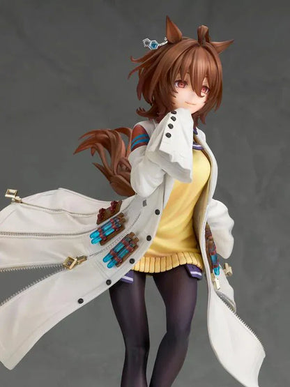 Agnes Tachyon 1/7 scale figure wearing an oversized white laboratory coat, yellow sweater, and dark tights on a decorative base.