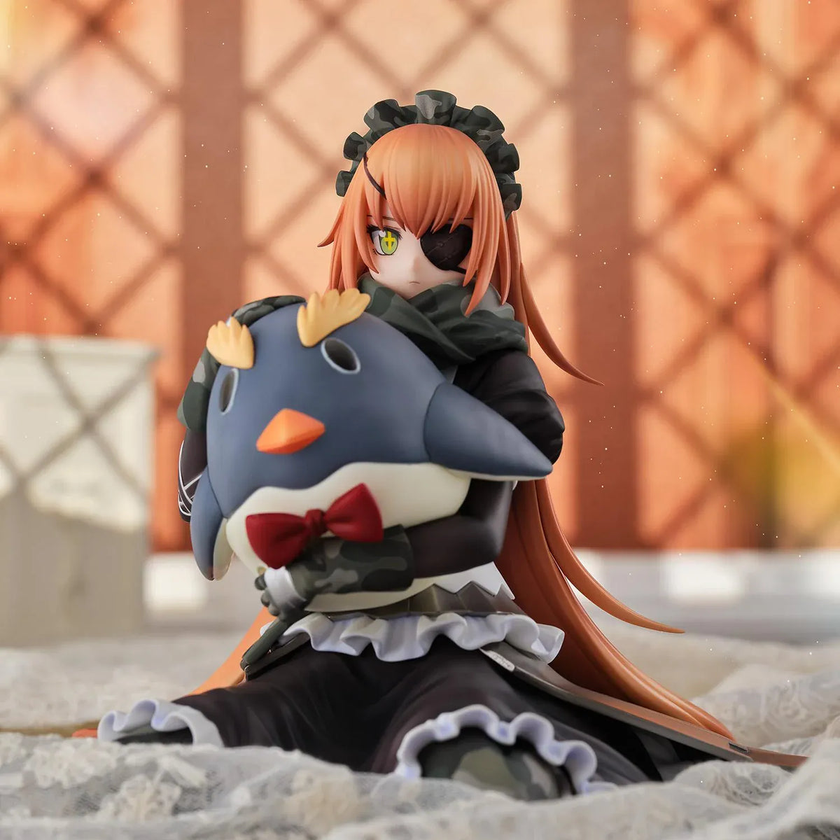 Overlord CZ2128 Delta 1/6 scale figure wearing her camouflage maid uniform and eyepatch while seated with a large penguin plush.