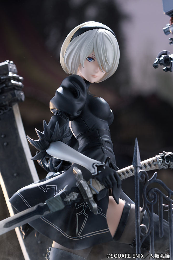 NieR: Automata Ver1.1a 2B (YoRHa No.2 Type B -Search-) 1/7 Scale Figure - Detailed anime figure of 2B in a vigilant pose with her weapon, featuring her black dress and Pod 042 on a realistic base.