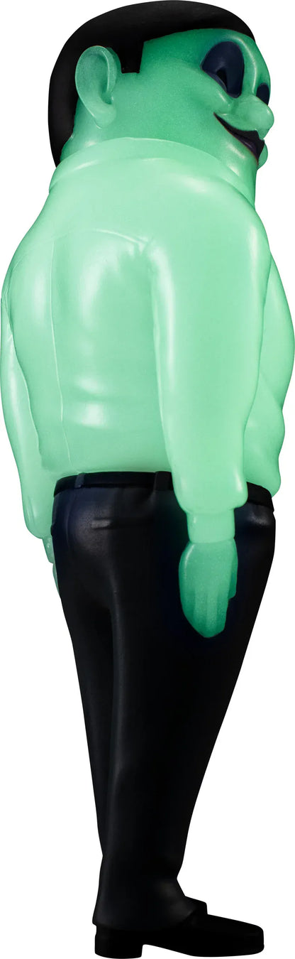 Alien Serpo sofubi figure from Dandadan with green body and black pants.