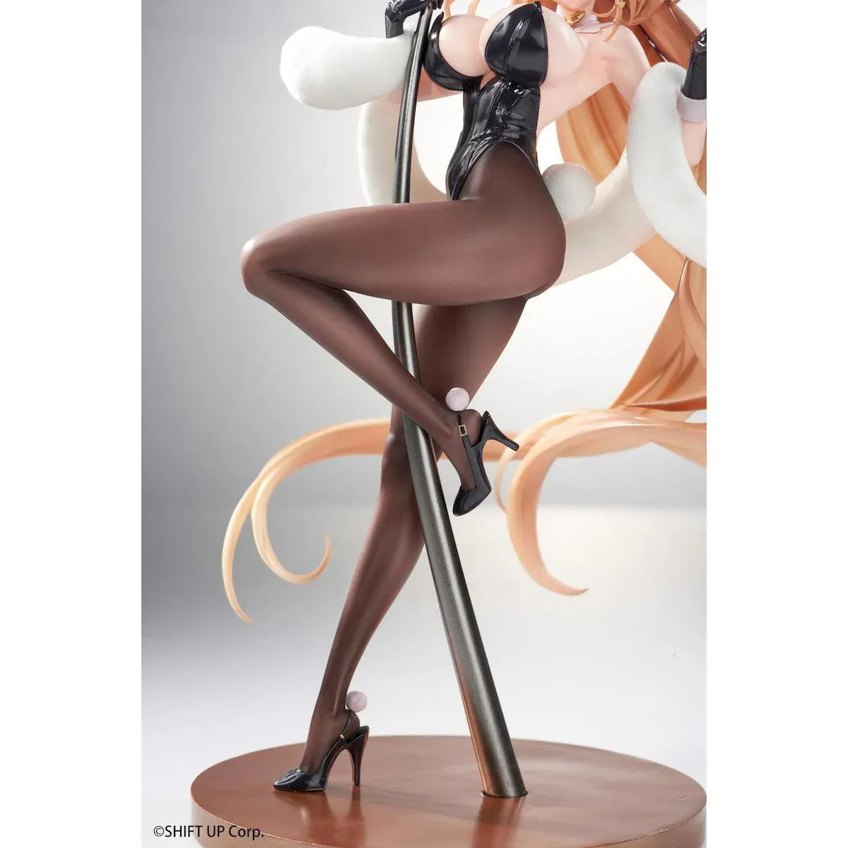 Goddess of Victory Nikke Rupee Lupin Rabbit Deluxe Ver. 1/10 Scale Figure with blonde hair, black bunny ears, rabbit outfit, posing pole, and display base