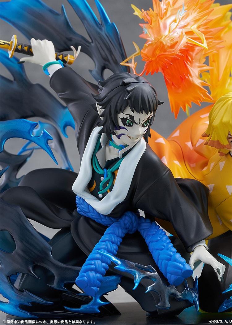 Zenitsu Agatsuma and Kaigaku Demon Slayer figure with lightning effects in dynamic battle pose