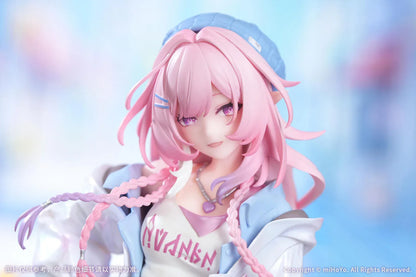 Honkai Star Rail Gift+ Cyrene Wonderful Holiday Ver. 1/8 Scale Figure featuring Cyrene with pink hair, pastel outfit, jacket, handbag, heart accent, and display base.