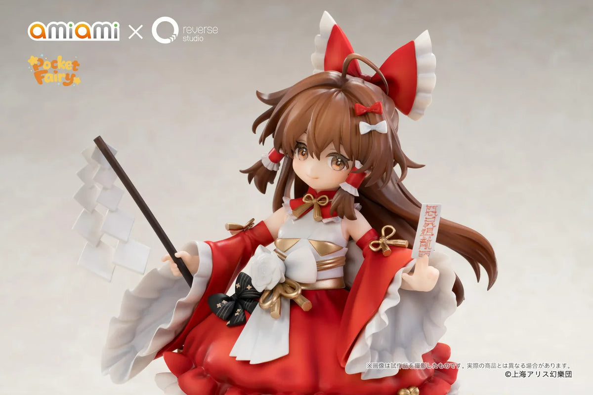 Touhou Project Pocket Reimu Hakurei figure holding a purification rod and ofuda talisman on a black-and-white yin-yang base.