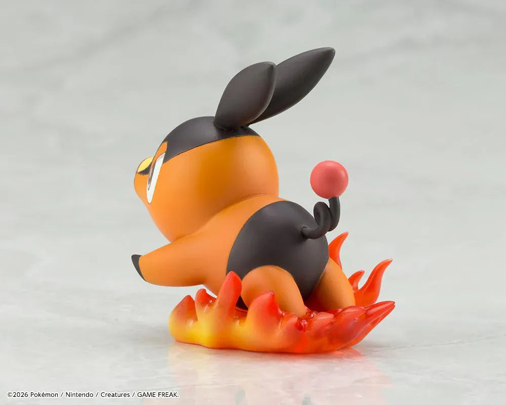 Pokemon ArtFX J Hilda with Tepig 1/8 Scale Figure Rerun featuring Hilda in her trainer outfit holding a Poké Ball with Tepig and flame effect on a display base.