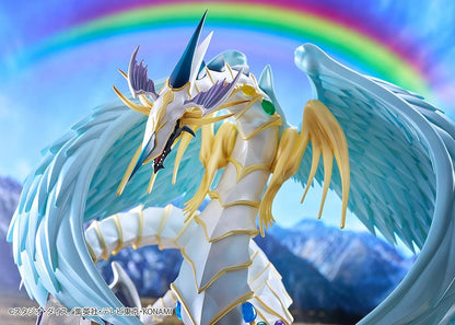 Yu-Gi-Oh! GX Rainbow Dragon figure with a pearlescent armored body, multicolored crystals, gold accents, and translucent blue wings.