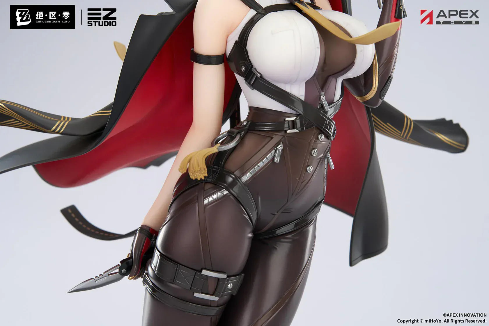 Zenless Zone Zero Evelyn Chevalier 1/7 scale figure by APEX Toys standing on display base wearing black combat outfit with red-lined cape.