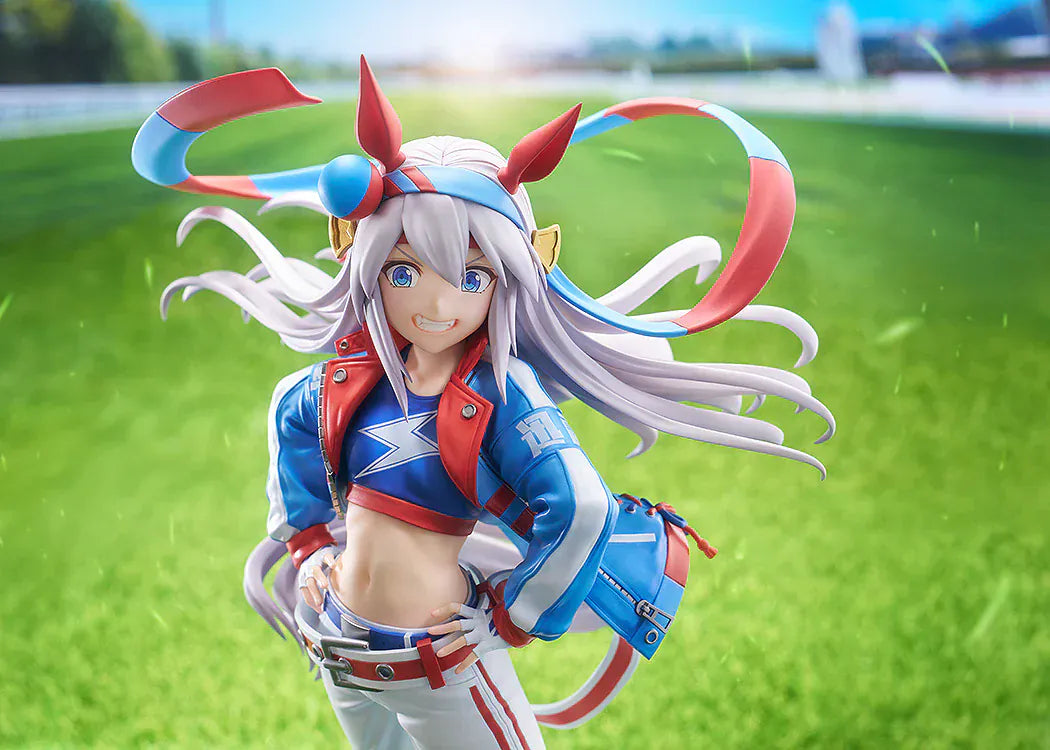 Uma Musume: Cinderella Gray Tamamo Cross 1/7 Scale Figure featuring Tamamo Cross in her vibrant blue and red racing jacket with confident pose and long flowing twin tails.
