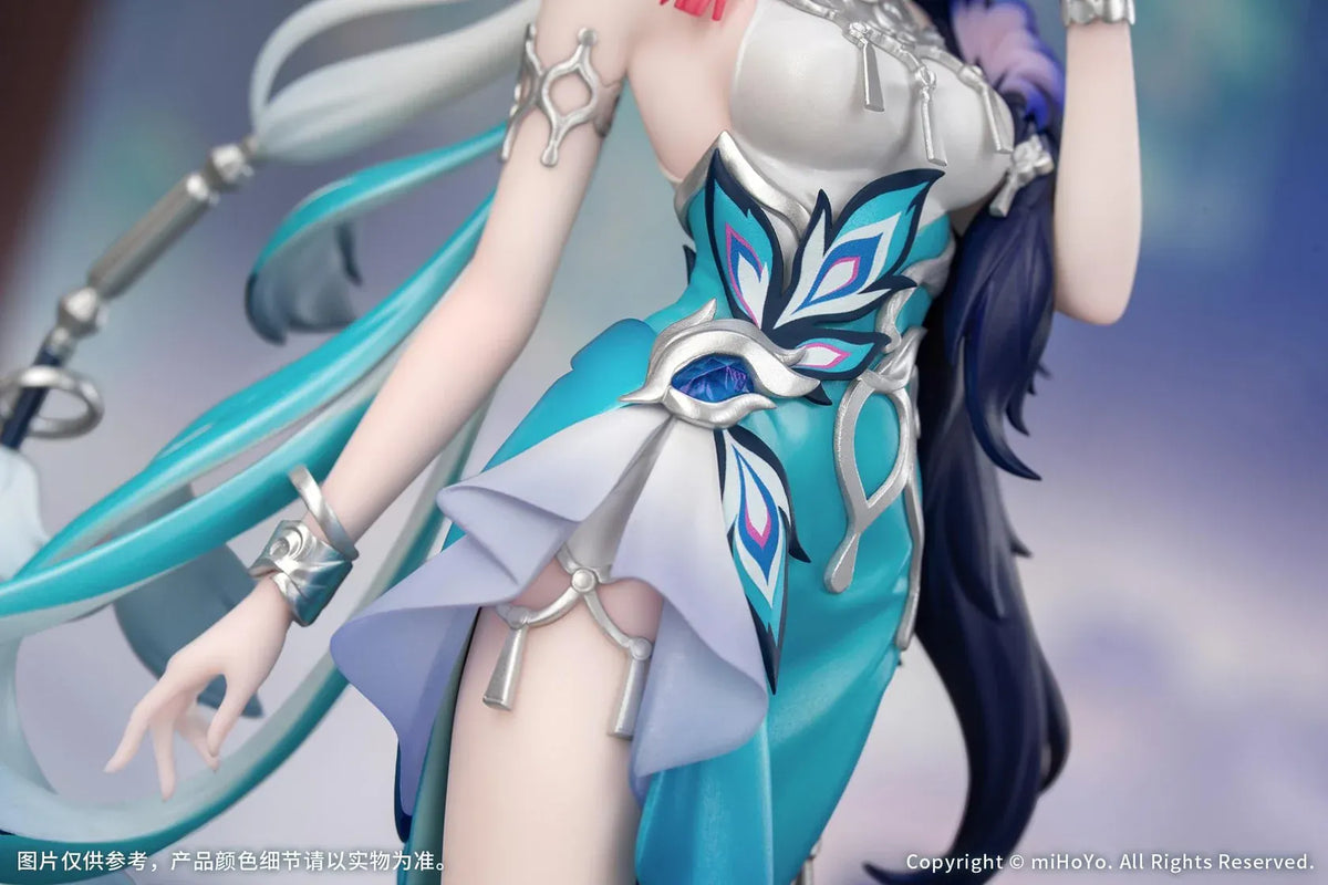 Yao Guang 1/8 scale figure wearing an elegant white-and-teal outfit with silver ornaments and feather-inspired decorations.