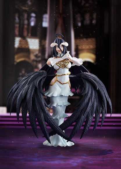Overlord The Holy Kingdom figma Albedo Figure wearing her white and gold dress with large black feathered wings and signature horns