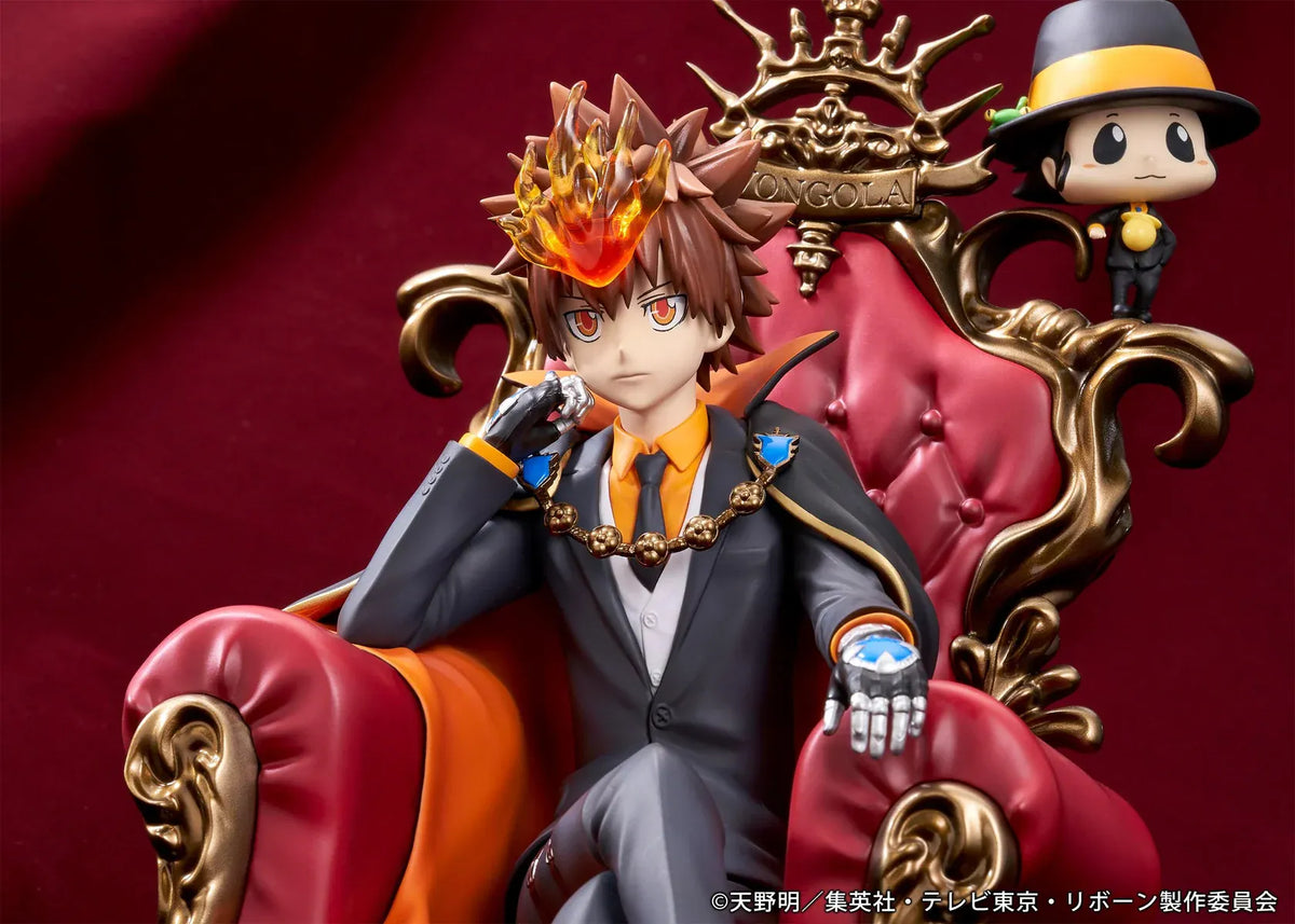 REBORN! Tsunayoshi Sawada & Reborn Scale Figure featuring Tsuna with spiky brown hair, a fiery Dying Will Flame, black suit, and orange-lined cape seated on an ornate golden throne with red upholstery, accompanied by Reborn in his signature fedora.
