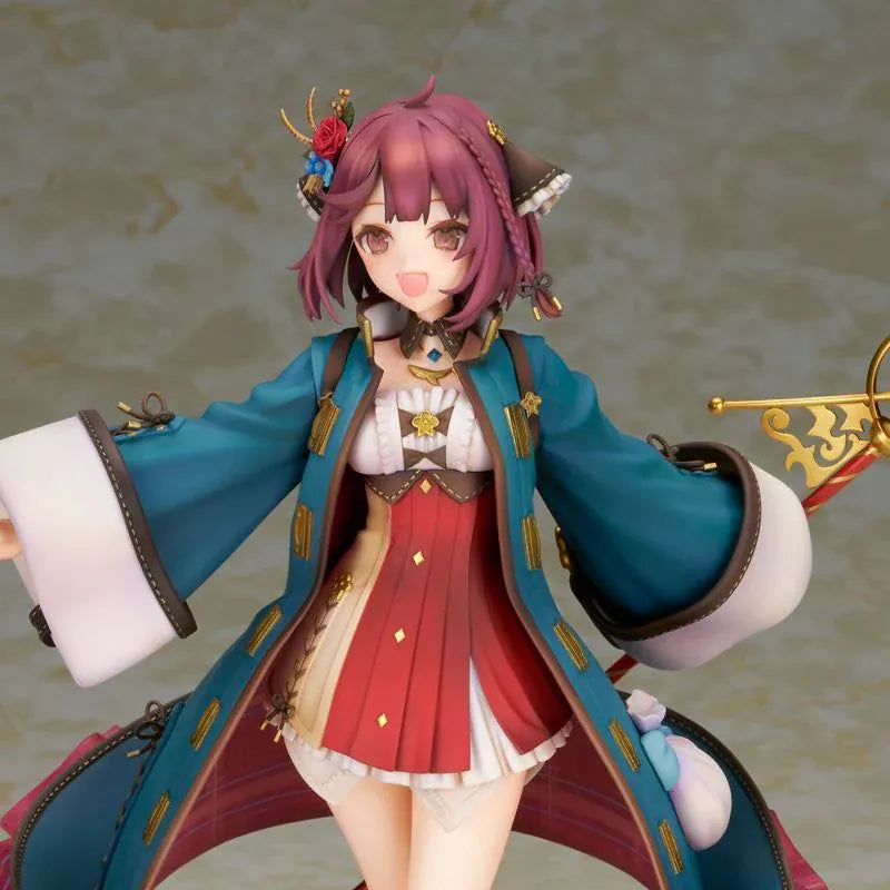 Sophie Neuenmuller figure smiling in a dynamic pose, wearing a teal coat over a red outfit and holding an ornate gold staff with a red orb.