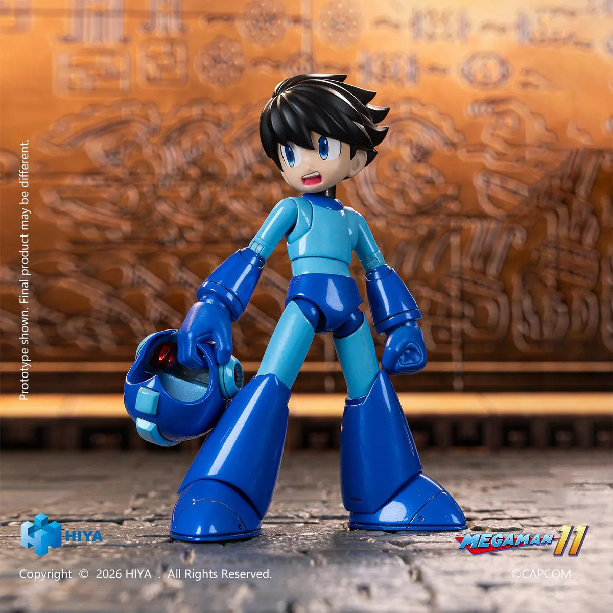 Mega Man Original Series action figure by Hiya Toys with interchangeable faces, hands, Mega Buster, charged-shot effect, and clear display stand.
