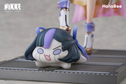 Goddess of Victory Nikke Syuen Deluxe Edition 1/6 Scale Figure featuring Syuen in a white-and-purple outfit with ribbon details, themed base, chibi mascot accent, can badge, and acrylic-style bonus artwork.