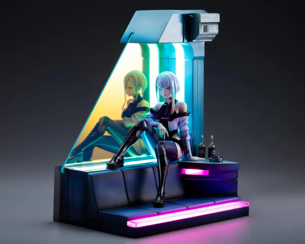 Cyberpunk Edgerunners Lucy 1/7 Scale Figure seated on a cyberpunk diorama base with blue translucent panel and neon details