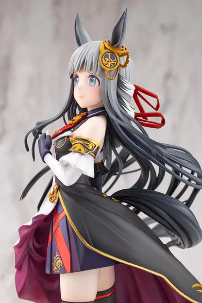 Umamusume Pretty Derby Chrono Genesis 1/7 Scale Figure featuring a silver-gray-haired horse girl with blue eyes, horse ears, and a flowing white, black, red, and gold racing outfit standing on a grassy display base.