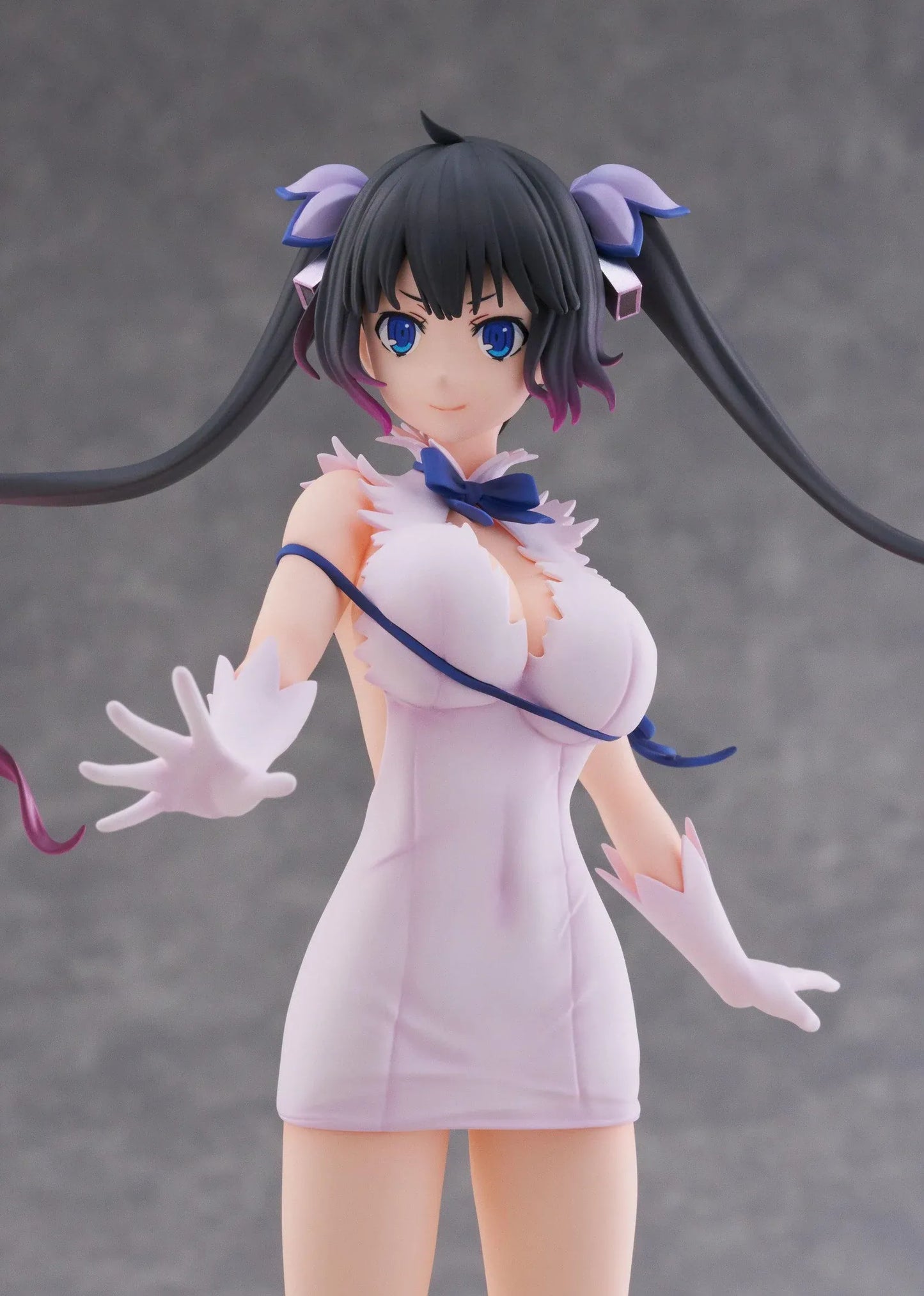 Is It Wrong to Try to Pick Up Girls in a Dungeon V Hestia Divinity Unleashed Limited Edition Ver. 1/7 Scale Figure with twin-tails, white outfit, blue ribbon accents, rocky base, and flame effect parts