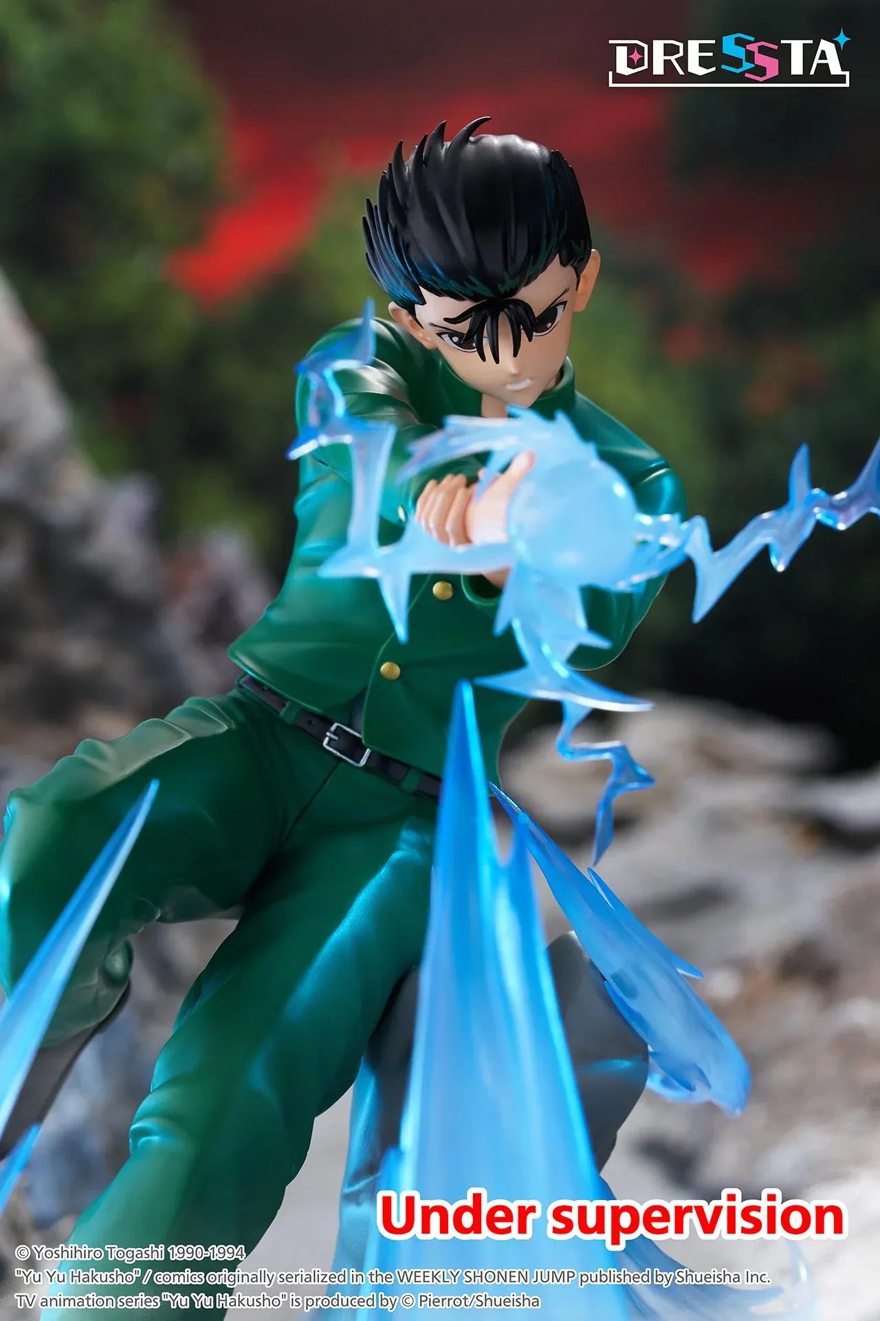 Yu Yu Hakusho Dressta Yusuke Urameshi Figure in green school uniform with blue spirit energy effect and rocky display base