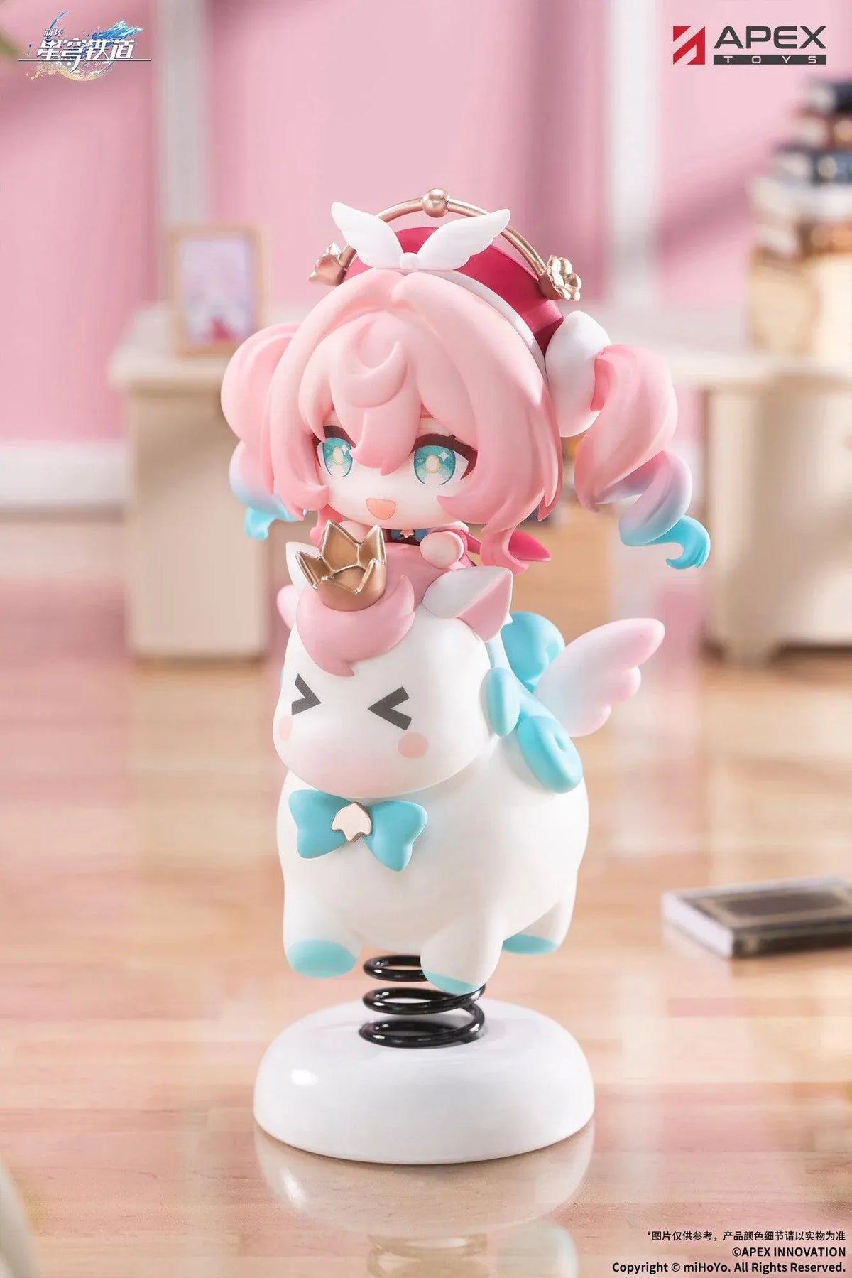 Honkai Star Rail Happy Shake Hyacine Non-Scale Figure by APEX Toys featuring a pink-haired anime girl with turquoise eyes riding a white winged companion with a golden crown and blue bow, mounted on a black spring and white circular base.